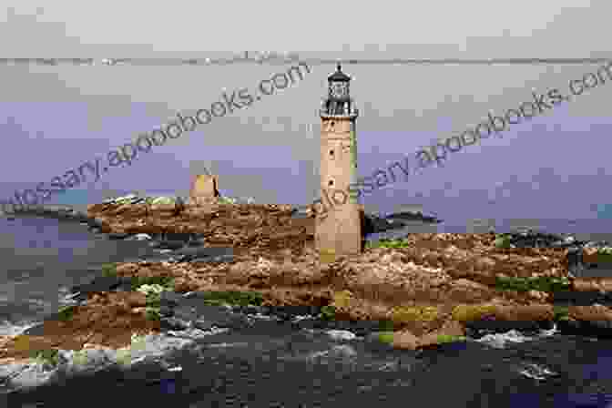 Aerial View Of A Lighthouse On A Rocky Outcrop, Surrounded By The Vast Expanse Of The Ocean Lighthouses: Connecticut And Block Island