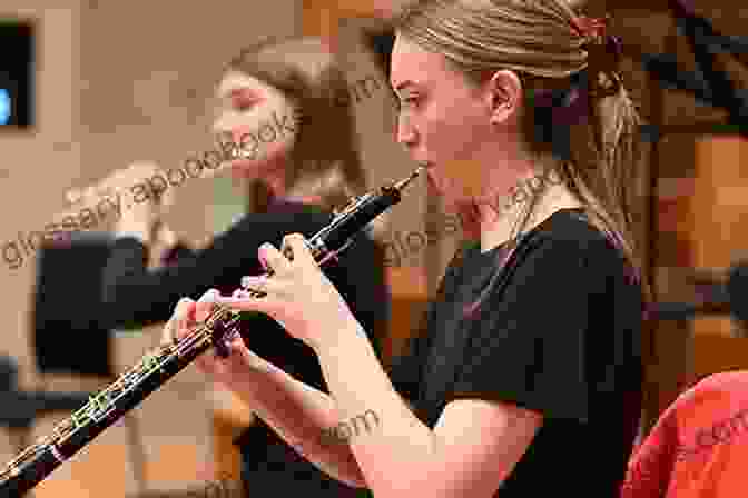 An Oboe Player Teaching A Young Student, Passing On The Knowledge And Tradition The Art Of Oboe Playing (The Art Of Series)