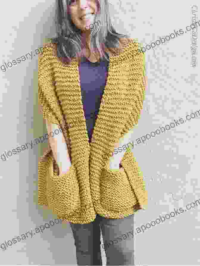 Knitted Pocket Shawl In Soft, Chunky Yarn Featuring A Spacious Pocket And Elegant Drape. Knitting Pattern KP596 Knitting Pattern For Pocket Shawl Chunky Yarn And Knitting Needles 6mm And 5 5mm