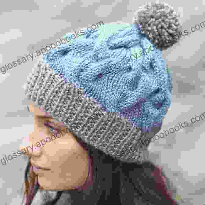 Ssk Baby Cable Pattern Hat In Soft Blue Yarn, Showcasing The Intricate Cable Pattern SSK Baby S Cable Pattern Hat